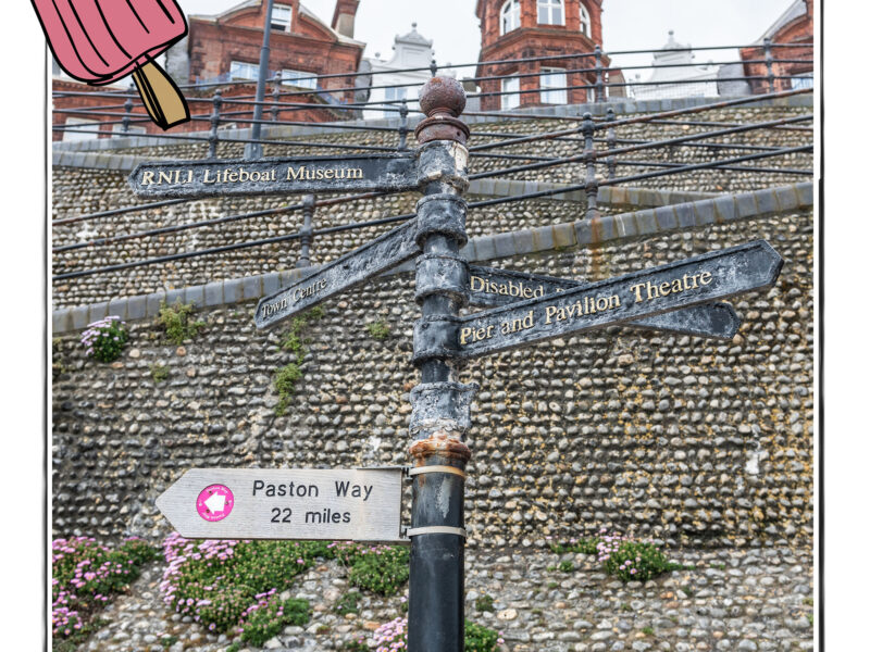 Image of steep steps to the beach in Norfolk, UK, with a signpost at the bottom, framed with a sketch line and overlaid with a hand drawn image of an ice cream
